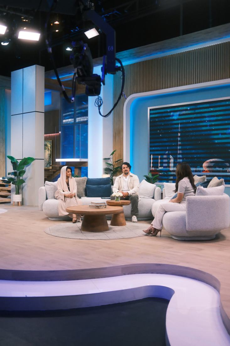 Dua hosting on set with guests, camera crane overhead